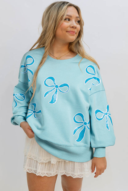 Sweatshirts & Hoodies- Oversized Sweatshirt with Sequined Bows- - IndioGear Women Clothing