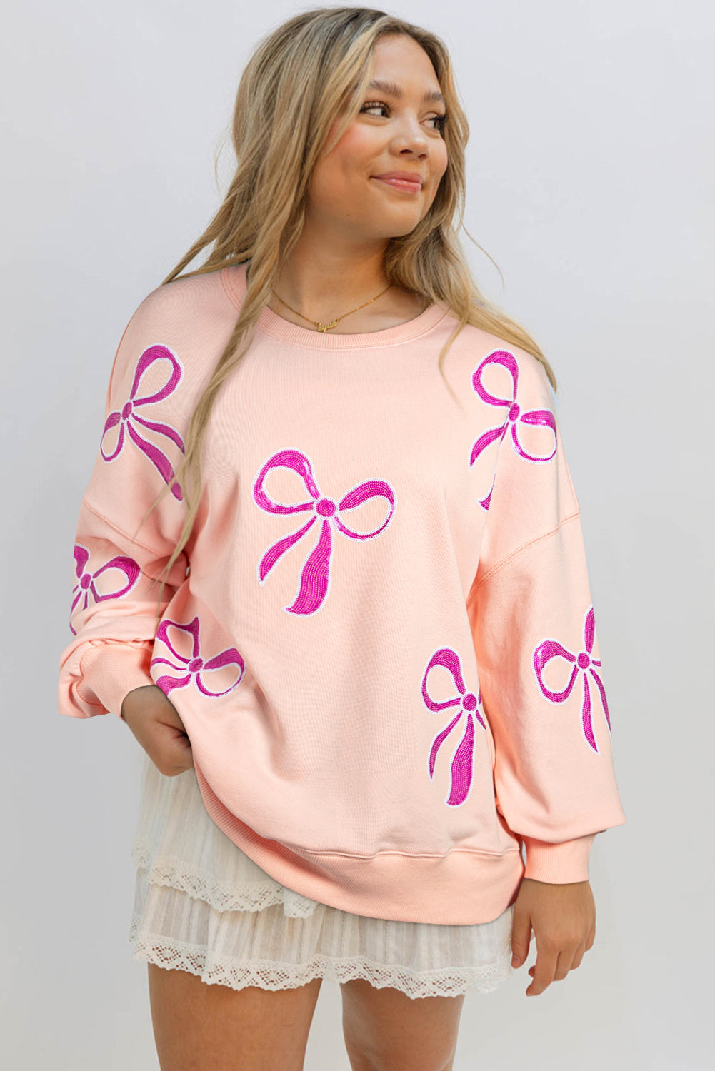 Sweatshirts & Hoodies- Oversized Sweatshirt with Sequined Bows- - IndioGear Women Clothing