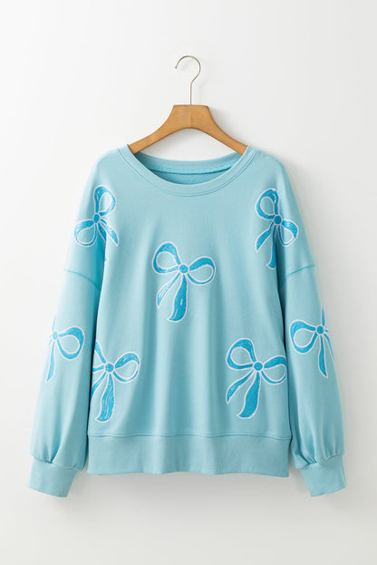 Sweatshirts & Hoodies- Oversized Sweatshirt with Sequined Bows- - IndioGear Women Clothing