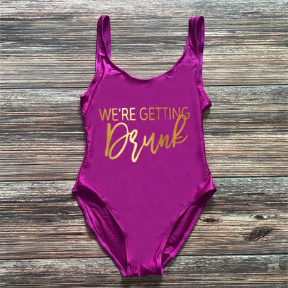 Swimwear- Bridal Squad Getting Married Print One-Piece Swimwear for Brides"- Purple Gold- IndioGear Fashion and Gear