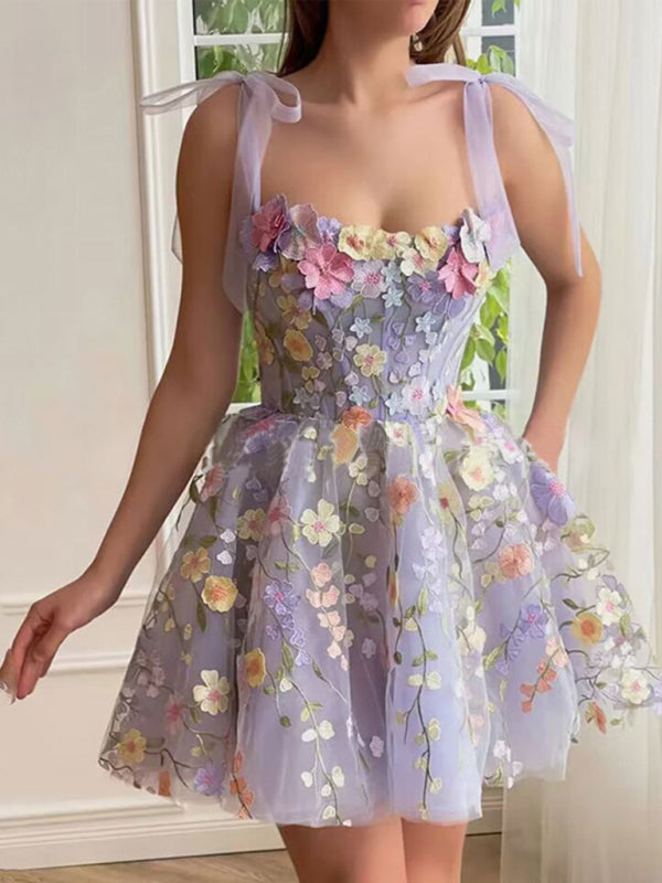 Robe de princesse de cocktail en tulle avec appliques florales et épaule nouée