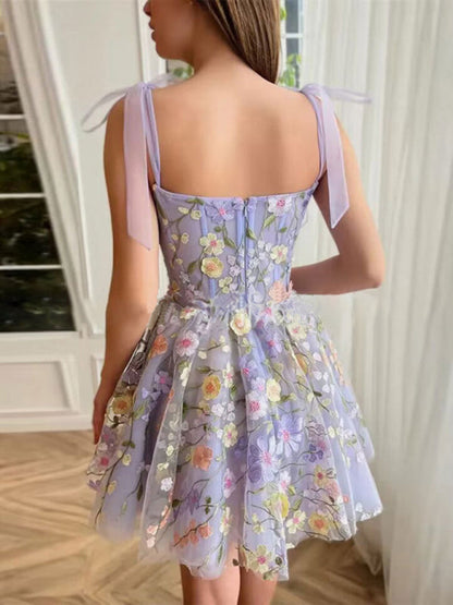 Cocktail-Prinzessinnenkleid aus Tüll mit Blumenapplikation und Schulterbindung